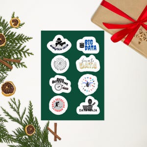 May include: A set of eight stickers on a green background. The stickers feature various data-related designs, including a ninja, a data detective, and a data agency. The text on the stickers includes "analytics ninja", "big data", "show me the data", "data detective", "data agency", and "data ninja".