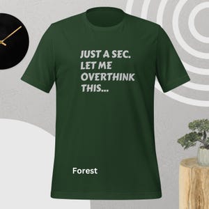 Front view, forest color, flat mock-up, Funny Quote T-Shirt - Printed With: 'Just a Sec, Let Me Overthink This' - Unisex Tee for Fans of Funny, Relatable Humor