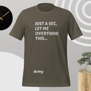 Front view, army color, flat mock-up, Funny Quote T-Shirt - Printed With: 'Just a Sec, Let Me Overthink This' - Unisex Tee for Fans of Funny, Relatable Humor