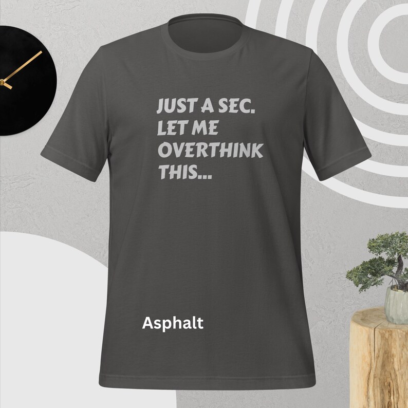 Front view, asphalt color, flat mock-up, Funny Quote T-Shirt - Printed With: 'Just a Sec, Let Me Overthink This' - Unisex Tee for Fans of Funny, Relatable Humor