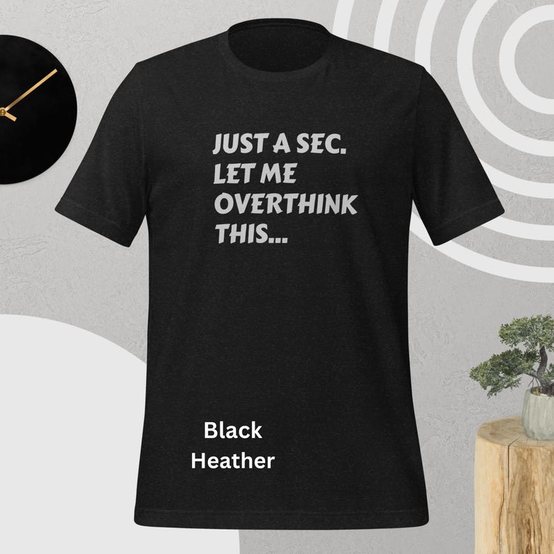Front view, black heather color, flat mock-up, Funny Quote T-Shirt - Printed With: 'Just a Sec, Let Me Overthink This' - Unisex Tee for Fans of Funny, Relatable Humor