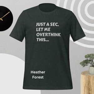 Front view, heather forest color, flat mock-up, Funny Quote T-Shirt - Printed With: 'Just a Sec, Let Me Overthink This' - Unisex Tee for Fans of Funny, Relatable Humor