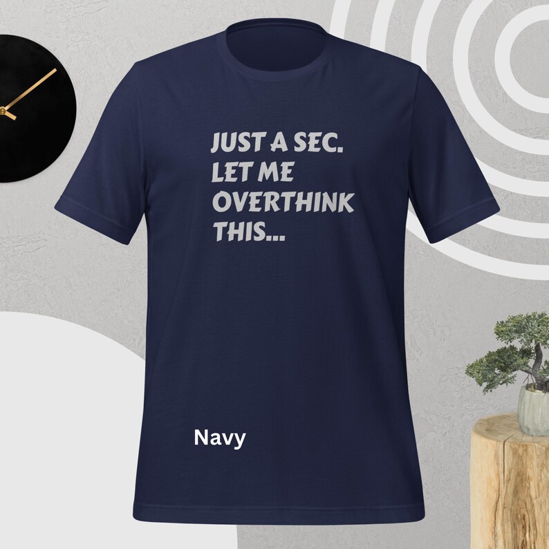 Front view, navy color, flat mock-up, Funny Quote T-Shirt - Printed With: 'Just a Sec, Let Me Overthink This' - Unisex Tee for Fans of Funny, Relatable Humor
