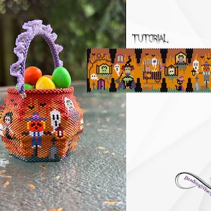 May include: A small, round, orange beaded basket featuring Halloween-themed motifs including ghosts, a scarecrow, and a witch, with a purple ruffled handle. Beside it is a flat, rectangular beadwork pattern labelled TUTORIAL.