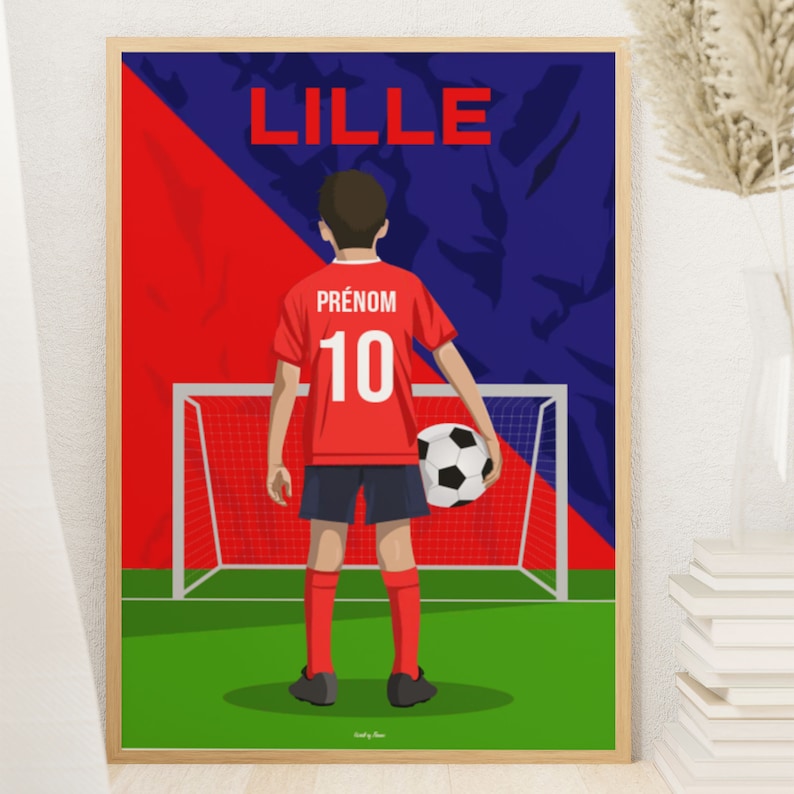 May include: A red and blue soccer poster with the word "LILLE" at the top. A young person wearing a red soccer jersey with the number "10" and the word "PR&Eacute;NOM" is standing in front of a soccer goal. The person is holding a soccer ball.