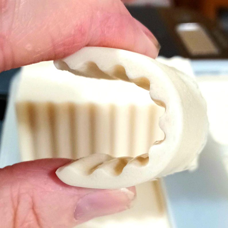 The Bend Test - Notice how far this soap bends? That's due to all the lotion packed into every bar! Try doing that with what you get at Wal-Mart...