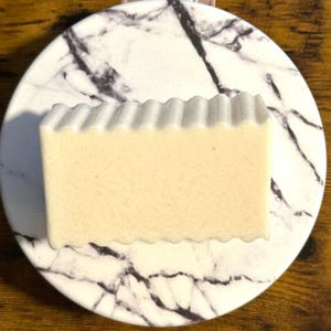 Our original Eczema lotion soap bar! Easy grip, unscented, and packed with lotion!