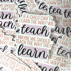 May include: A stack of pink and white stickers with the text "If a child can't learn the way we teach, maybe we should teach the way they learn." The stickers are printed with black text and have a pink and white background.