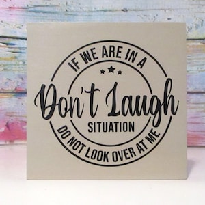 If we are in a dont laugh situation - do not look over at me sign - Funny office decor