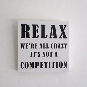 &quot;Lustiges Relax Holzschild – &quot;&quot;Relax, We&#39;re All Crazy, It&#39;s not a konkurrenz&quot;&quot; - 20x20&quot;