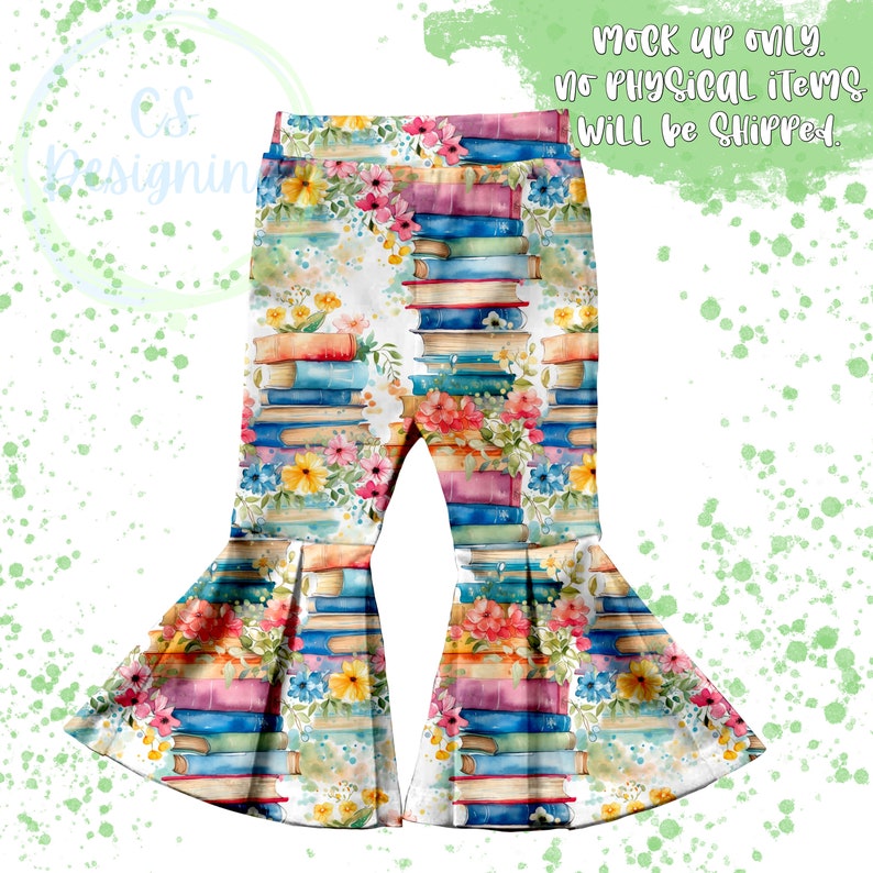 May include: White bell bottom pants with a watercolor print of colorful flowers and stacks of books. The print is repeated throughout the pants.
