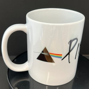 Pink Floyd The Dark Side coffee mug.  Pink Floyd logo.