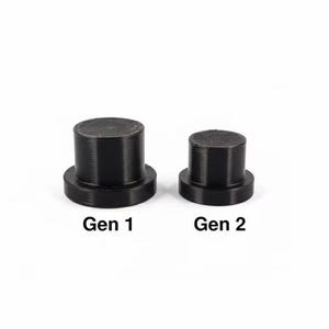 May include: Two black cylindrical objects, labeled "Gen 1" and "Gen 2", are displayed against a white background. The objects have a circular base and a shorter, narrower cylindrical top. The "Gen 1" object is slightly larger than the "Gen 2" object.