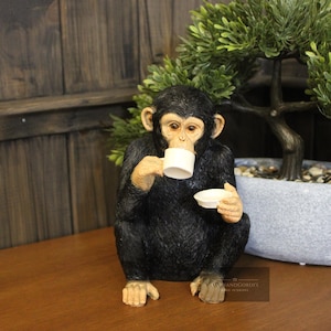 Monkey Drinking Tea
