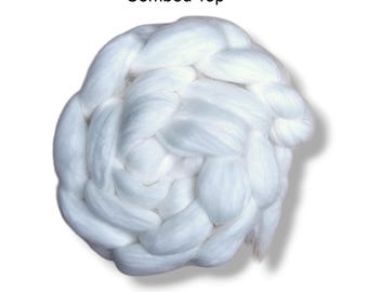 May include: White Angora combed top, a fluffy and soft fiber ready for spinning or felting.