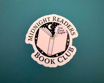 May include: White sticker with a black circle and the text "Midnight Readers Book Club" with a crescent moon and open book illustration. The book has the text "One More Chapter" inside.