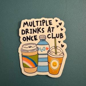 May include: A sticker featuring three beverage illustrations: a coffee cup with a rainbow design, a water bottle with "H2O" text, and a smoothie with a smiley face. The text "MULTIPLE DRINKS AT ONCE CLUB" is at the top.