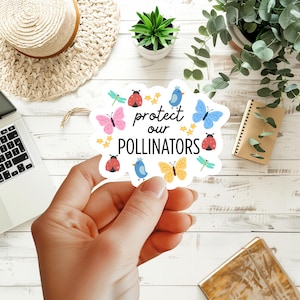 May include: A white die-cut sticker featuring the black text protect our POLLINATORS surrounded by colorful illustrations of butterflies, ladybugs, dragonflies, small blue birds, and yellow stars on a white background with a scalloped edge.