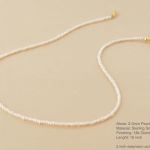May include: A delicate white pearl necklace with a 16 inch length. The necklace is made of sterling silver and has a 18k gold plate finish. The pearls are 2-3mm in size. A 2 inch extension is available as an option.