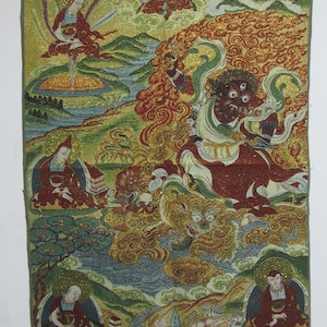 May include: A detailed tapestry featuring several figures in traditional robes, set against a backdrop of mountains, clouds, and water. The artwork uses a rich palette of reds, greens, and golds, with intricate patterns and textures.