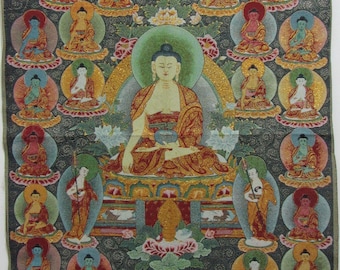 May include: An ornate tapestry depicting a central Buddha figure, encircled by smaller Buddhas in various colours. The artwork displays intricate detailing, set against a dark background with floral motifs, creating a vibrant and spiritual composition.