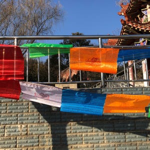 A string of 20 pieces prayer flag  with patterns and  Buddhist scriptures Colorful  Buddhistic Wall Hanging Cotton Silk lacy wall Art Decor