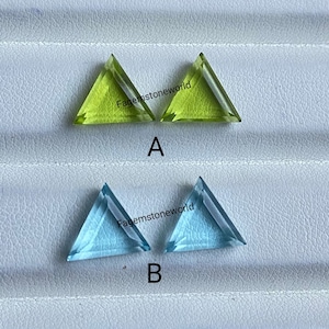 Peut inclure: Deux pierres précieuses triangulaires vertes et deux pierres précieuses triangulaires bleues. Les pierres précieuses sont étiquetées A et B. Le texte "Fagemstoneworld" est visible sur l'image.