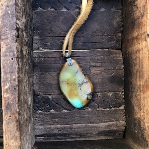 Turquoise Pendant On Tan Leather Lace