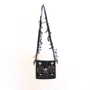 Sac naga en perles