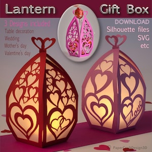 Könnte beinhalten: Drei Papierlaternen-Designs mit Herz-Motiv. Die Laternen sind rot, rosa und lila und haben ein weißes Inneres. Die Laternen sind von innen beleuchtet und erzeugen ein warmes Leuchten. Der Text "Lantern" und "Gift Box" ist auf dem Bild zu sehen. Der Text "Download Silhouette files SVG etc" ist ebenfalls sichtbar.