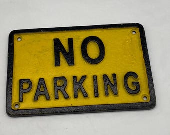 Vintage cast iron "No Parking" sign with 4 screw holes. Black prominent writing on a bright yellow background.  It will be noticed! 18x11cm.