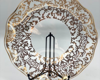 Very pretty glass serving plate with gilded lace patterning and fluted edges.