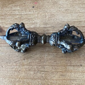1960’s solid Brass Vajra, Dorje measuring 9cm. Patination with age makes this a beautiful item.