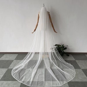 Minimalist tulle wedding veil. Ivory bridal veil with satin edge. One-layer cathedral veil. Elegant bridal veil.