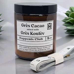 May include: A brown glass jar with a black lid and a white label that reads "Grès Cacao" and "Grès Koulèv". The jar is next to a white measuring tape. The jar is 8 oz.