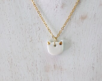 Small artisan porcelain ceramic gold cat charm necklace