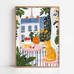 May include: A framed art print showing a Parisian scene. A ginger cat sits on a pink stool, looking at a table with cake and strawberries. The Eiffel Tower and a building with blue roofs are visible through a window, surrounded by foliage.