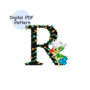 May include: Digital PDF pattern featuring a pixelated letter "R" decorated with string lights and a green and white character. The text "Digital PDF Pattern" is in a blue circle.