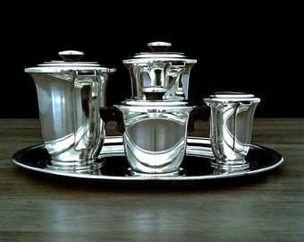 Service à thé et café Ravinet d'Enfert, XXe siècle Art déco fini argent brillant, vers 1930.