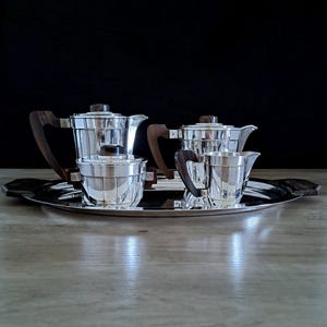 5 Piece Tea and Coffee Service by Saglier Frères Paris. Rare, Complete 1930s Art Deco Set, Silverplate over Maillechort with Macassar Wood.