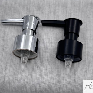 Pompa erogatrice di sapone liquido in plastica nera e argento da 28 mm