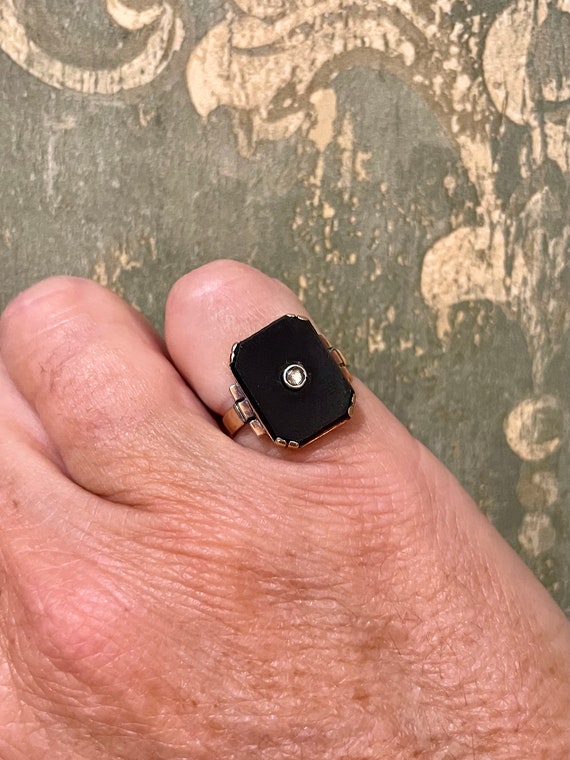 Art Deco rose gold, onyx and small diamond ring; t