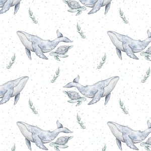 May include: A seamless pattern featuring watercolor illustrations of blue whales and sea turtles swimming in a white background with scattered blue dots and green sprigs.