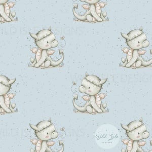 May include: A seamless pattern featuring a light blue background with a subtle speckled texture. The pattern features a repeating design of a cute, grey dragon with pink wings and a floral crown. The dragon is sitting on a small patch of green grass. A small bee is flying near the dragon.