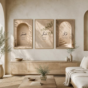 May include: Three rectangular wall art prints in light wood frames featuring beige archways and olive branches. The prints display black Arabic calligraphy with English translations: Sabr for Patience, Shukr for Gratitude, and Tawakkul for Trust in Allah.