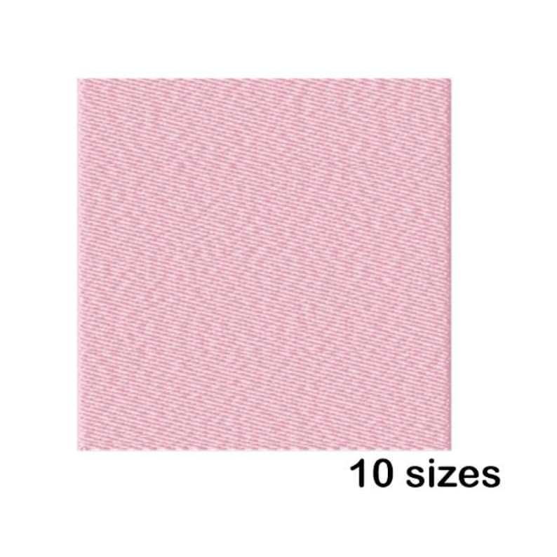 May include: A square of pale pink fabric with a textured weave. The image includes the text "10 sizes" in black, indicating the availability of the fabric in multiple sizes. The fabric appears to be a solid colour.