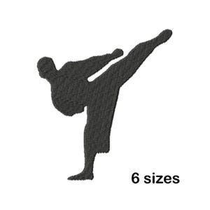 May include: Black silhouette of a person in a martial arts pose, kicking with their right leg raised high. The silhouette is against a white background. 6 sizes.