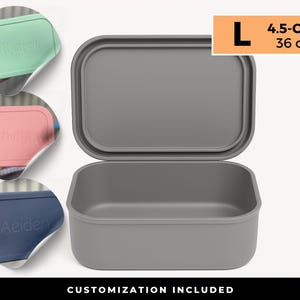 May include: A grey rectangular food container with a matching lid, labelled "L" and "4.5-Cup 36 oz". Three smaller lids in mint green, pink, and navy blue are shown with personalized names. The text "CUSTOMIZATION INCLUDED" is at the bottom.
