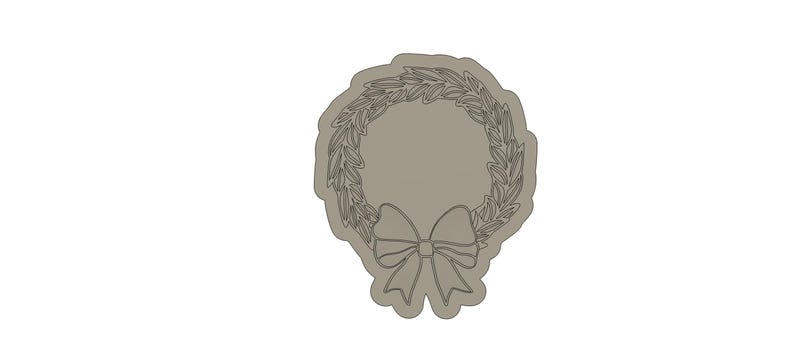 May include: A brown wreath with a simple bow in the center. The wreath is made of leaves and the bow is white.