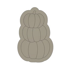 Puede incluir: Una pila de tres calabazas grises, con la calabaza de arriba teniendo un tallo.